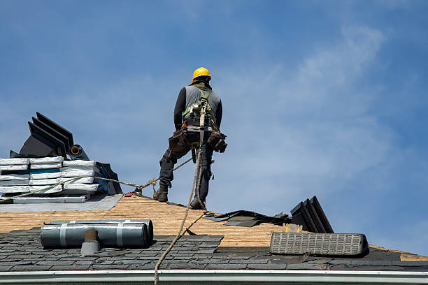Professional Roof Replacement technician working in Devon, PA